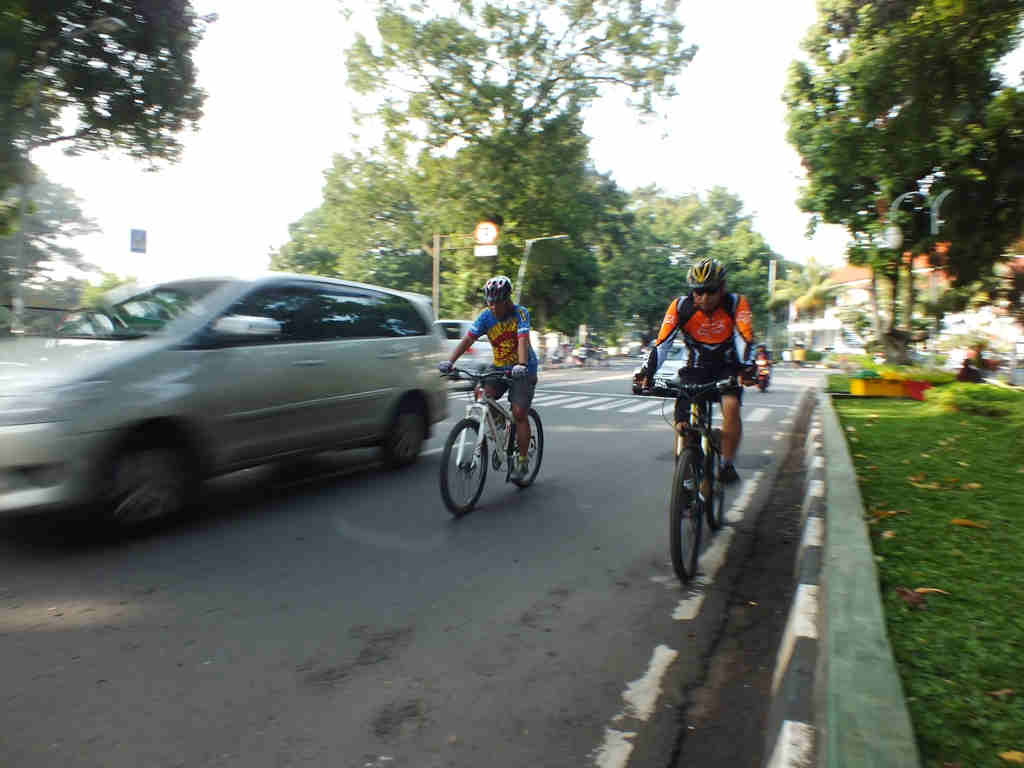 Bicycle rider on Juanda Street